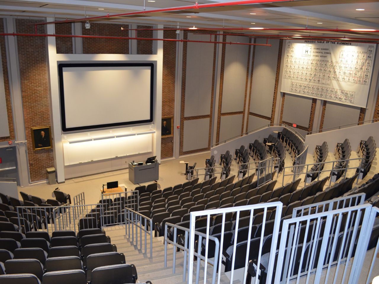 UGA Chemistry Auditorium periodic table on wall, front screen and seating